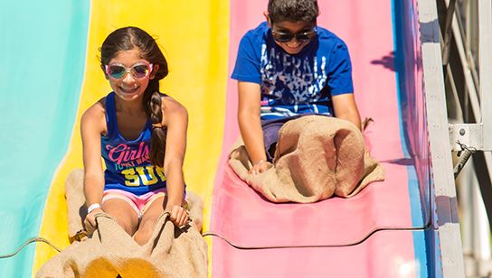 Kids on the big slide at Splatter